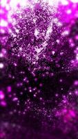 Bright violet splashes, twisted into a spiral, fly towards us and scatter. video