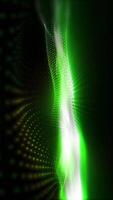 Green abstract matter plays with waves and light in space. video