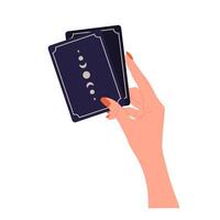 Hand holding tarot cards with boho moon. Female fortune teller predicting future. Magic and esoteric. illustration in flat cartoon style vector