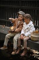A boy and girl sit with lighter enjoy a simple meal on a weathered bridge, their wicker basket filled with fresh bread in a timeless, nostalgic moment. photo