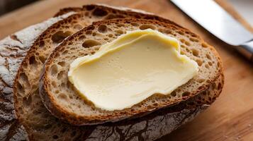 A slice of bread with butter on it photo