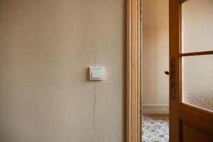 A door with a light switch on it photo