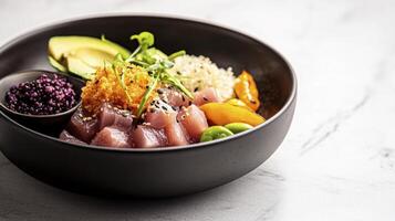 A bowl of sushi with avocado, tuna, and rice photo