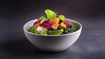 A bowl of food with vegetables and other ingredients photo