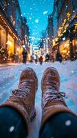 POV vertical shot of snowy boots on a festive street at twilight, illuminated by Christmas lights photo