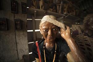 Souvenirs Women's wood sculptures are better known as Tao Tao among indigenous cultures of Tana Toraja in Sulawesi photo