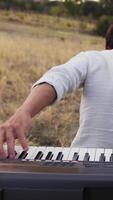 Man Plays The Keyboard Backwards In The Nature video