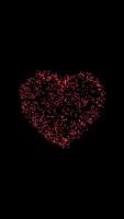 Heart Shape Made By Floating Electrons Particles For Valentines Day On Black video