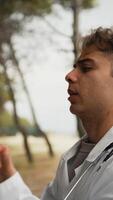Technician Talks To The Trunk Of A Tree Like A Crazy Person In The Park video