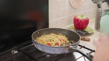 Chef Cooking In A Pan Spaghetti With Tomato And Zucchini As A First Course video