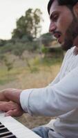 Smile Man Play The Musical Keyboard Crossing In Rhythm In The Nature video