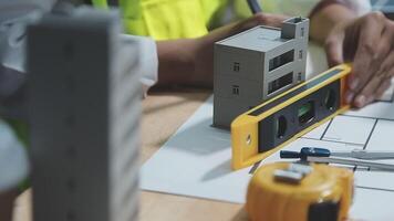 A person is working on a construction project video