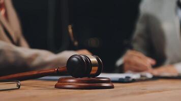 Lawyer and judge sitting at a desk video