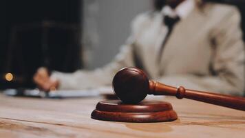A judge's gavel on a wooden table video
