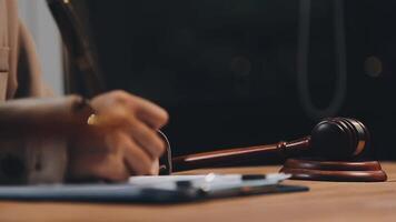 A judge's gavel on a wooden desk video
