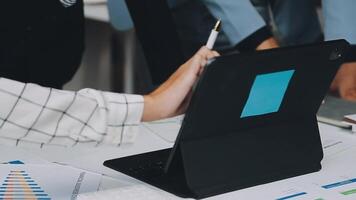 A person is using a tablet on a desk video