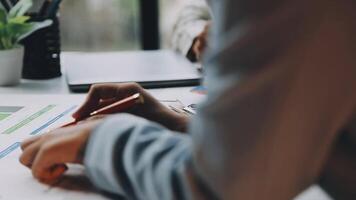A person is writing on a piece of paper with a pen video