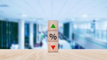 Financial, stocks, interest rate and GDP percent change, wooden block with percentage sign and arrow up sign and down for interest rate, ranking, gdp up photo