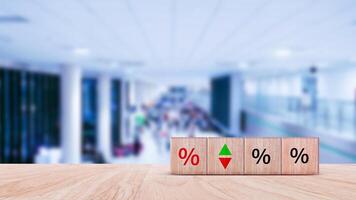 Financial, stocks, interest rate and GDP percent change, wooden block with percentage sign and arrow up sign and down for interest rate, ranking, gdp, photo