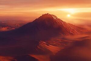 Sun setting behind a snow capped mountain range in a red landscape photo