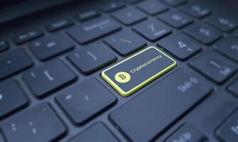 cryptocurrency concept on a highlighted keyboard key. Business and finance photo
