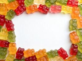 A frame formed from a bunch of colorful gummy bears photo