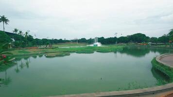 Tranquil Park with Fountain and Pond video