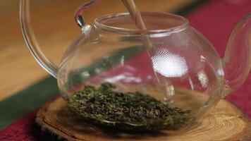 The highlights the serene tea making process with green tea. Media video