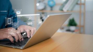 SEO Concept search engine optimization, Businessman using computer to show SEO on website for search engine ranking or SEO, AI Assistant search on screen, Marketing information technology. photo