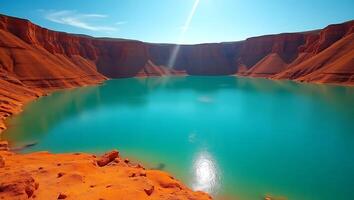 Beautiful turquoise lake surrounded by red cliffs under clear blue sky photo