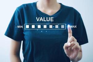 Business woman pointing at virtual icon download progress display To add added value to business products. photo