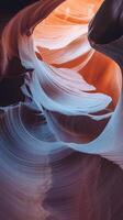 A stunning view of colorful canyon walls with soft curves and vibrant hues of orange and blue. photo