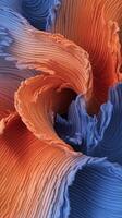 Abstract swirling patterns in vibrant orange and blue tones create a striking visual effect. photo