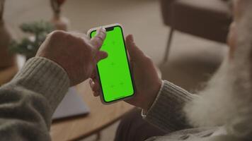 Senior Man Swipe and Click on Green Screen Smartphone video