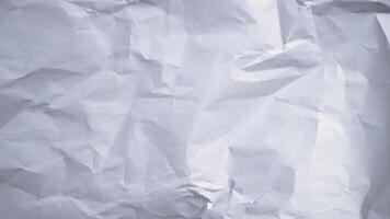 Wrinkled paper texture White crumpled sheet stop motion seamless loop video