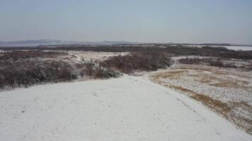 Aerial view to the ground covered with ice at the morning video
