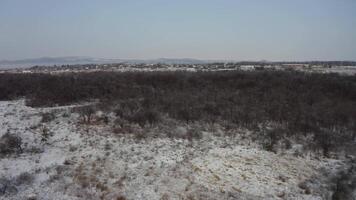 View from a drone to the ground covered with ice at the morning video