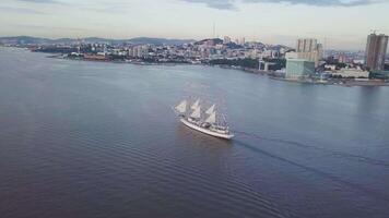 Aerial view of the frigate Nadezhda under sail in the Amur Bay video