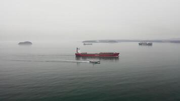 Drone view of the a pilot boat and multipurpose vessel Shantar in motion video