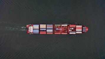 Aerial view of the a container vessel in motion video