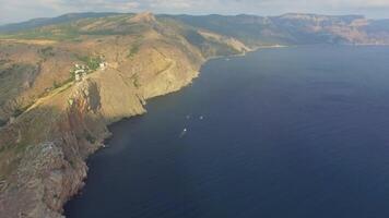 Drone view of the steep cliffs and the remains of a destroyed fortress video