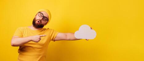 man point at storage cloud panoramic on yellow photo