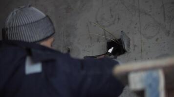 Electrician Installing Wires in Concrete Wal video