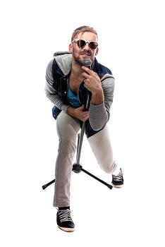 man singing with microphone portrait photo