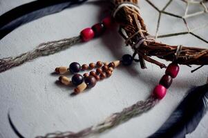 Dream catchers, their elements. Natural materials, threads, wood. Omulet for a restful sleep. Shamanism. photo