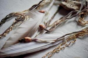 Dream catchers, their elements. Natural materials, threads, wood. Omulet for a restful sleep. Shamanism. photo