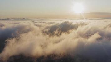 View from a drone of city center, above which clouds are rapidly floating video