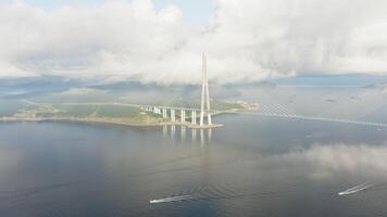 Sunrise over the Russian bridge. Drone view through the fog video