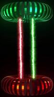 Red and green laser beam between two 3D toroid shapes video