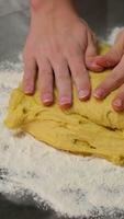 Bakery. Closeup view of a woman beating a key lime pie cream in a glass bowl with an electric mixer. video